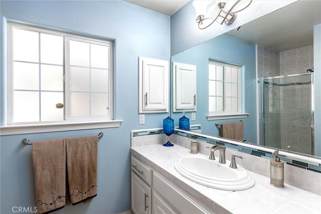 620 Camino Roble, Nipomo, CA 93444 - bathroom with vanity, a stall shower, plenty of natural light, and decorative backsplash