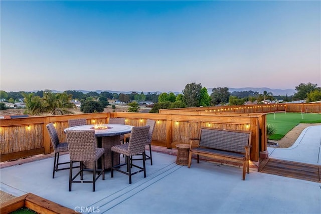 620 Camino Roble, Nipomo, CA 93444 - view of patio featuring a putting green and an outdoor fire pit