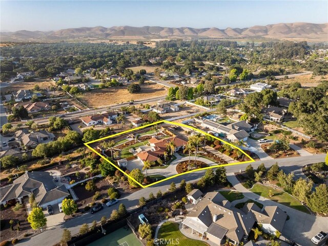 620 Camino Roble, Nipomo, CA 93444 - aerial view of residential area with mountains and property boundaries highlighted