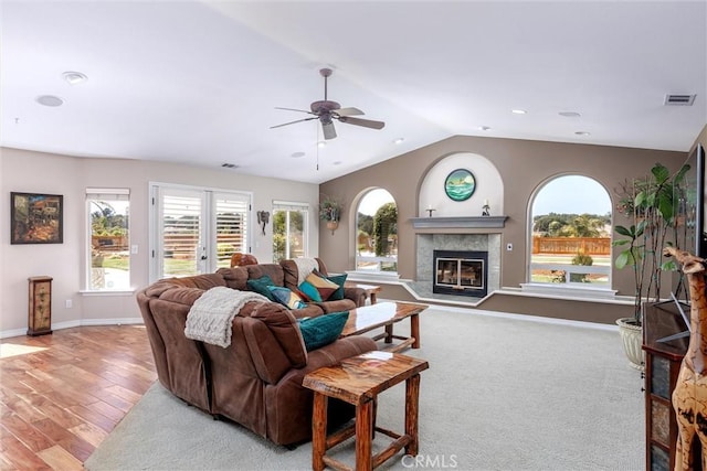 620 Camino Roble, Nipomo, CA 93444 - living room with plenty of natural light, ceiling fan, lofted ceiling, a glass covered fireplace, and wood finished floors