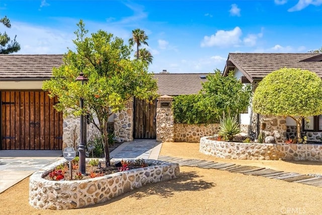 27151 Mission Hills Dr, San Juan Capistrano, CA 92675 - view of front of property with stone siding