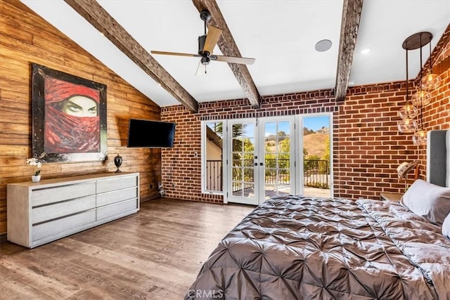 27151 Mission Hills Dr, San Juan Capistrano, CA 92675 - bedroom with access to outside, french doors, wood finished floors, wood walls, and brick wall