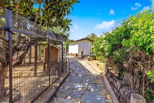 27151 Mission Hills Dr, San Juan Capistrano, CA 92675 - view of yard with an outdoor structure