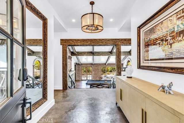 27151 Mission Hills Dr, San Juan Capistrano, CA 92675 - foyer with coffered ceiling, finished concrete flooring, beamed ceiling, a chandelier, and recessed lighting