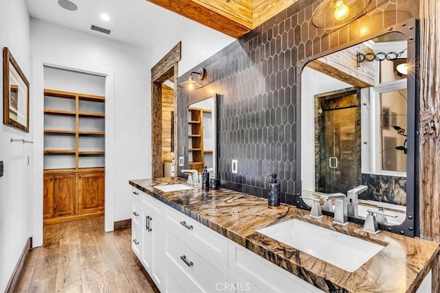 27151 Mission Hills Dr, San Juan Capistrano, CA 92675 - bar area featuring a sink and light wood-style floors