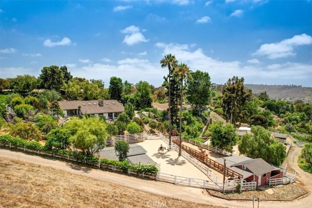 27151 Mission Hills Dr, San Juan Capistrano, CA 92675 - view of property's community featuring an exterior structure, an outdoor structure, and view of wooded area