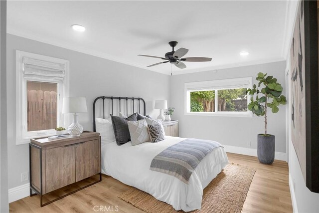 12012 Paseo Bonita, Los Alamitos, CA 90720 - bedroom featuring light wood-type flooring, recessed lighting, a ceiling fan, and ornamental molding