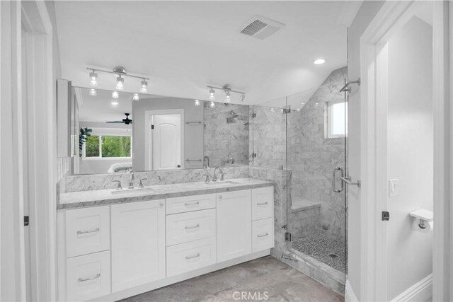 12012 Paseo Bonita, Los Alamitos, CA 90720 - full bathroom featuring a marble finish shower, double vanity, and a ceiling fan