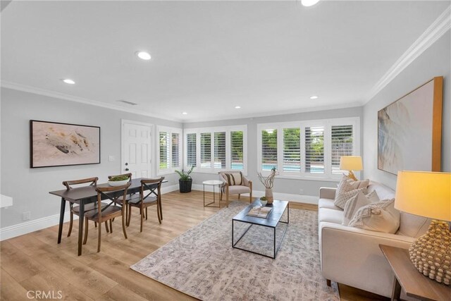12012 Paseo Bonita, Los Alamitos, CA 90720 - living room featuring crown molding, light wood-style flooring, and recessed lighting