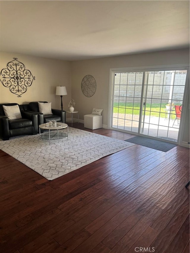 1398 Tartan Cir, Placentia, CA 92870 - living area featuring dark wood-style floors and baseboards