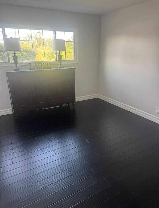 1398 Tartan Cir, Placentia, CA 92870 - empty room featuring plenty of natural light and dark wood-style flooring