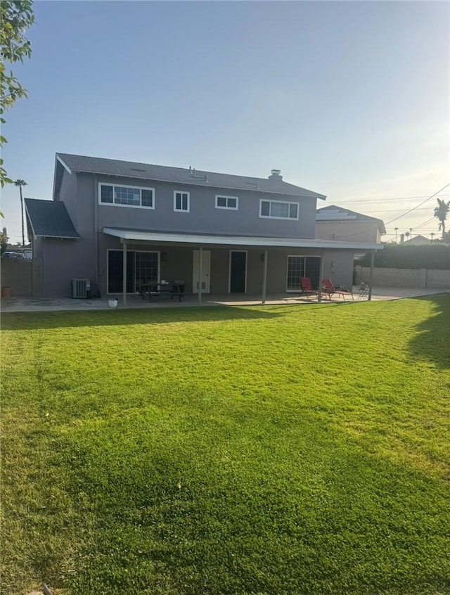 1398 Tartan Cir, Placentia, CA 92870 - rear view of house featuring a patio area, a lawn, and stucco siding