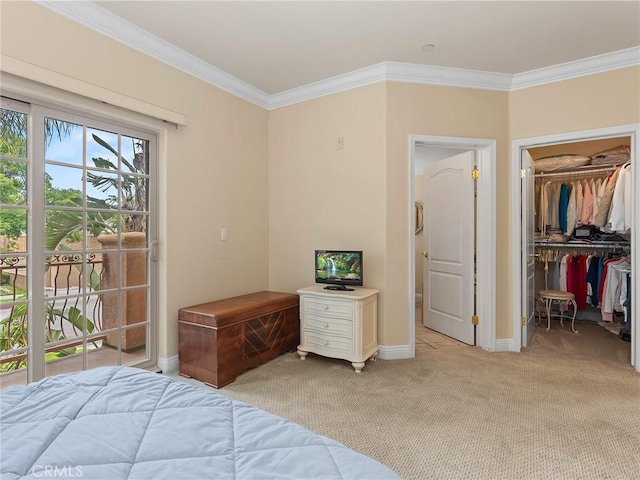 421 E Santa Anita Ave Unit 101, Burbank, CA 91501 - bedroom featuring light carpet, crown molding, a walk in closet, and a closet