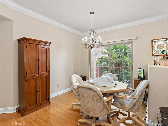 421 E Santa Anita Ave Unit 101, Burbank, CA 91501 - dining room featuring ornamental molding, light wood-style floors, and a chandelier