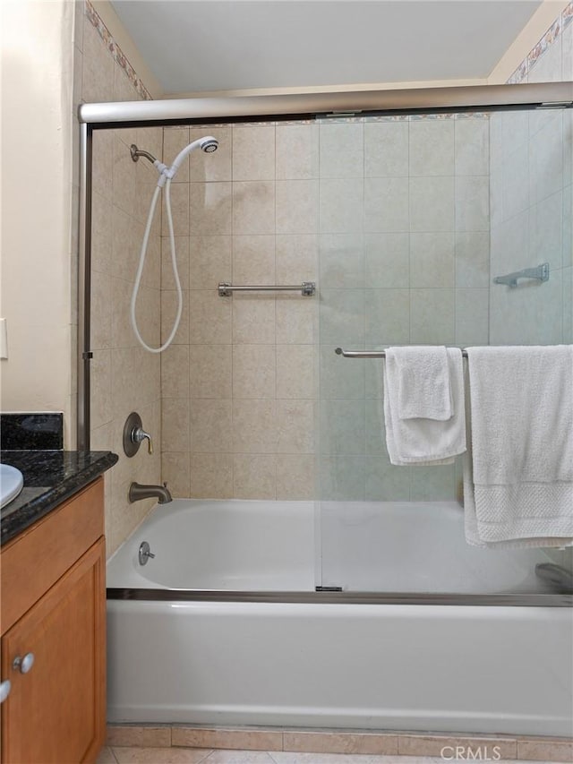 421 E Santa Anita Ave Unit 101, Burbank, CA 91501 - full bath with vanity, shower / bath combination with glass door, and tile patterned floors