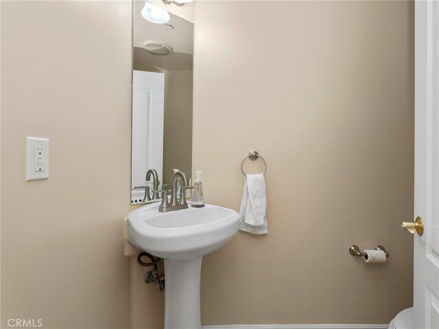 421 E Santa Anita Ave Unit 101, Burbank, CA 91501 - bathroom featuring toilet and a sink