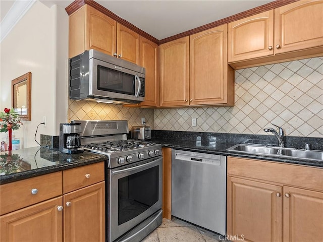 421 E Santa Anita Ave Unit 101, Burbank, CA 91501 - kitchen with appliances with stainless steel finishes, decorative backsplash, and dark stone counters