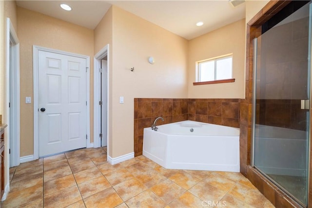 9600 S Loop Blvd, California City, CA 93505 - bathroom with a bath, a stall shower, tile patterned flooring, and recessed lighting