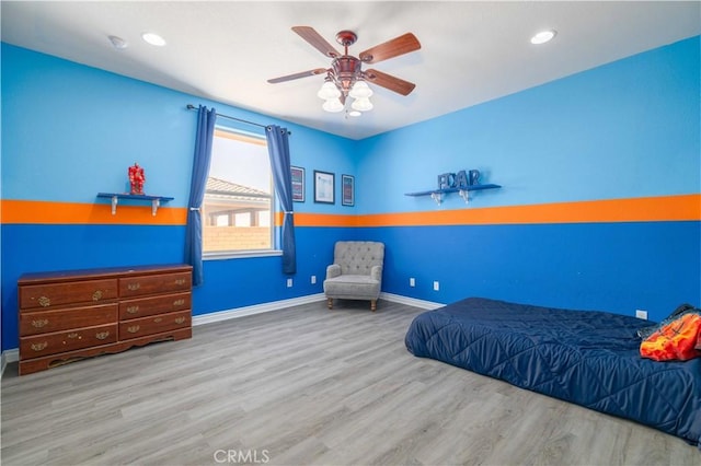 9600 S Loop Blvd, California City, CA 93505 - bedroom featuring wood finished floors, a ceiling fan, and recessed lighting