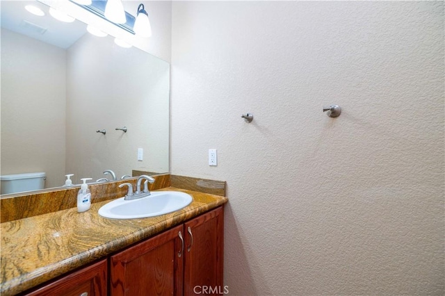 9600 S Loop Blvd, California City, CA 93505 - bathroom featuring vanity and toilet