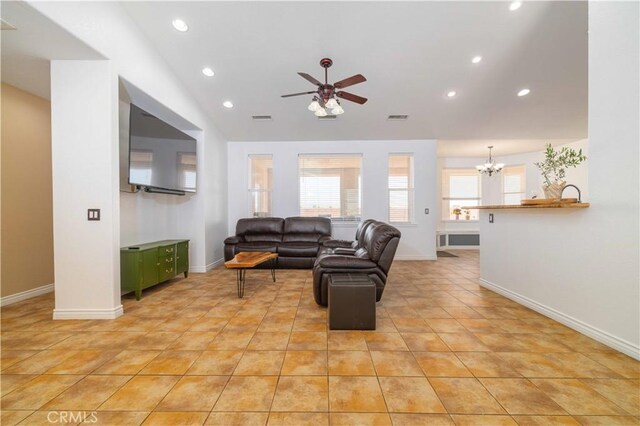 9600 S Loop Blvd, California City, CA 93505 - living room featuring ceiling fan, a chandelier, recessed lighting, light tile patterned floors, and vaulted ceiling