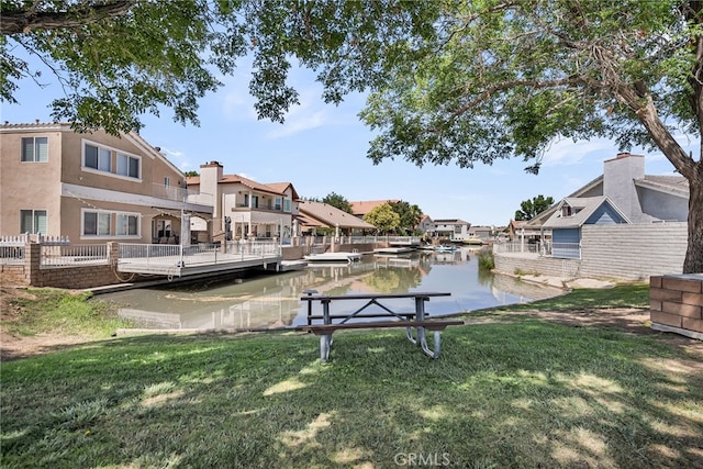13180 Meteor Dr, Victorville, CA 92395 - dock area with a lawn, a water view, and a residential view