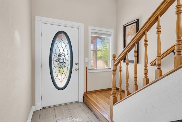 13180 Meteor Dr, Victorville, CA 92395 - entryway with baseboards and stairway