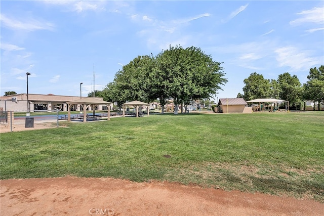 13180 Meteor Dr, Victorville, CA 92395 - view of property's community featuring a gazebo, a yard, and a carport
