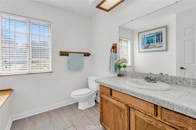 13180 Meteor Dr, Victorville, CA 92395 - bathroom featuring vanity and healthy amount of natural light