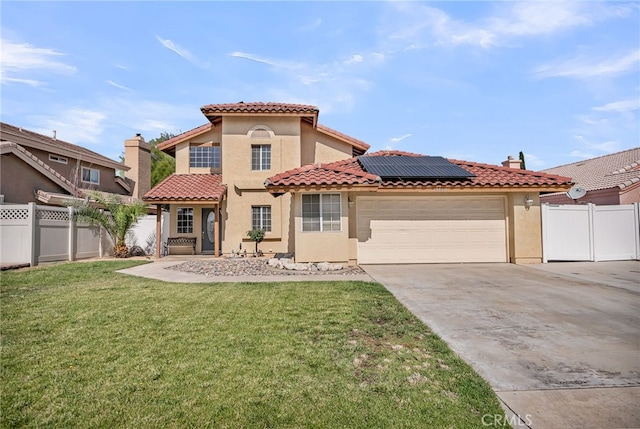 13180 Meteor Dr, Victorville, CA 92395 - view of front of property featuring solar panels, stucco siding, driveway, a garage, and a tiled roof