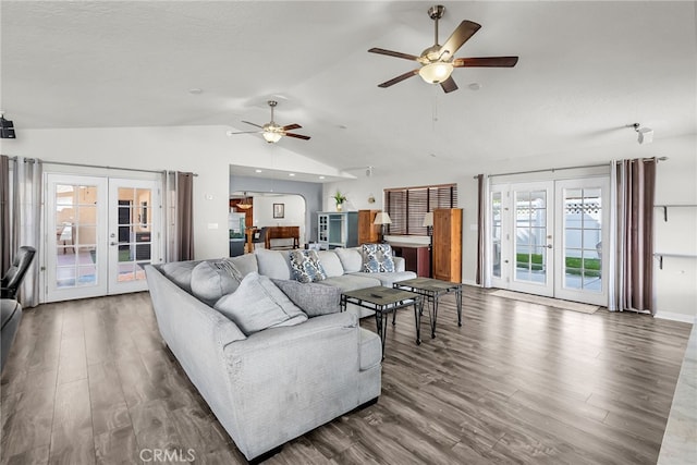 13180 Meteor Dr, Victorville, CA 92395 - living area with french doors, vaulted ceiling, ceiling fan, and wood finished floors