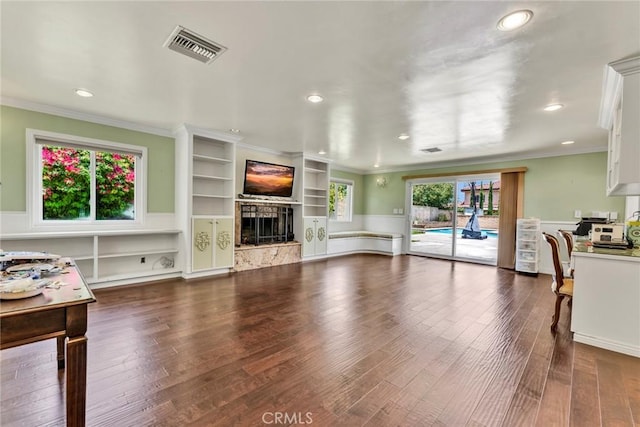 1719 Turnbull Canyon Rd, Hacienda Heights, CA 91745 - unfurnished living room featuring ornamental molding, recessed lighting, wood finished floors, a fireplace, and built in features