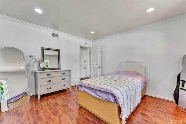 1719 Turnbull Canyon Rd, Hacienda Heights, CA 91745 - bedroom featuring crown molding, arched walkways, wood finished floors, and recessed lighting