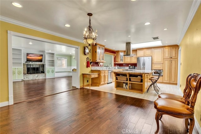 1719 Turnbull Canyon Rd, Hacienda Heights, CA 91745 - kitchen with appliances with stainless steel finishes, island range hood, light wood-style floors, light countertops, and ornamental molding