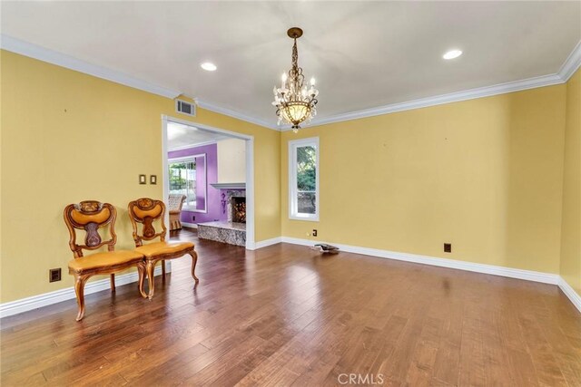 1719 Turnbull Canyon Rd, Hacienda Heights, CA 91745 - dining room featuring a chandelier, crown molding, dark wood-style flooring, a lit fireplace, and recessed lighting