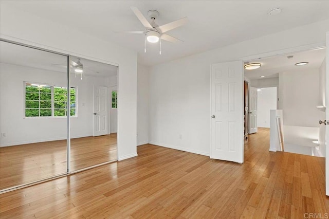4772 Gateshead Rd, Carlsbad, CA 92010 - unfurnished bedroom with light wood finished floors, a closet, and ceiling fan