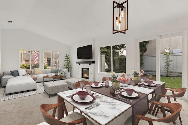 4772 Gateshead Rd, Carlsbad, CA 92010 - carpeted living area with vaulted ceiling and a fireplace