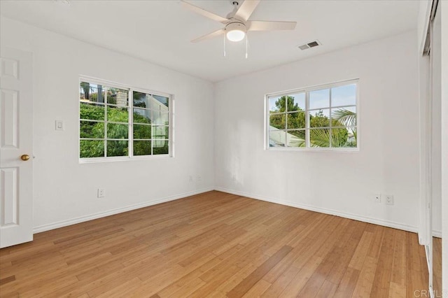 4772 Gateshead Rd, Carlsbad, CA 92010 - unfurnished room with healthy amount of natural light, light wood-style floors, and ceiling fan