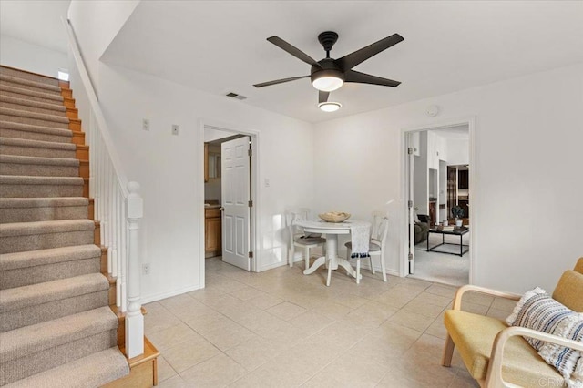 4772 Gateshead Rd, Carlsbad, CA 92010 - dining room with stairway, a ceiling fan, and light tile patterned flooring