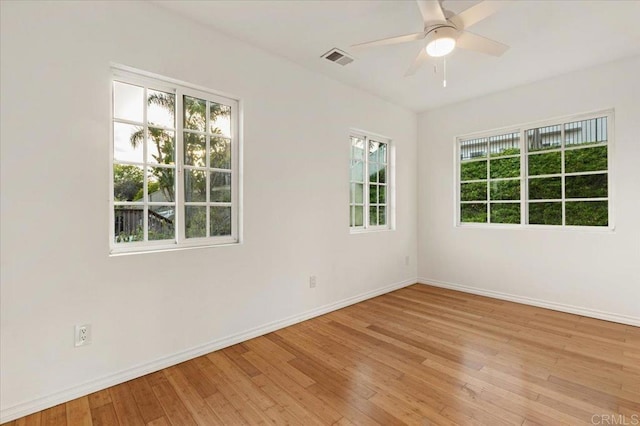 4772 Gateshead Rd, Carlsbad, CA 92010 - unfurnished room featuring healthy amount of natural light, light wood finished floors, and a ceiling fan