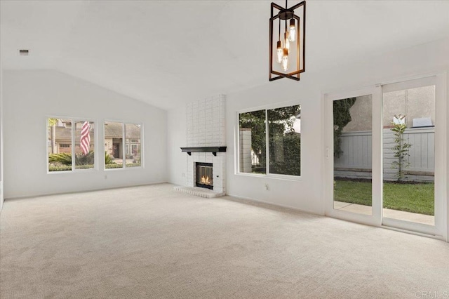 4772 Gateshead Rd, Carlsbad, CA 92010 - unfurnished living room featuring carpet, lofted ceiling, plenty of natural light, a fireplace, and a chandelier