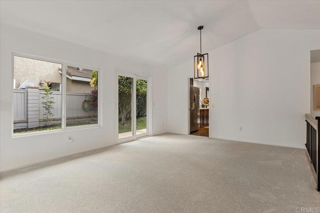 4772 Gateshead Rd, Carlsbad, CA 92010 - unfurnished living room featuring lofted ceiling and carpet flooring