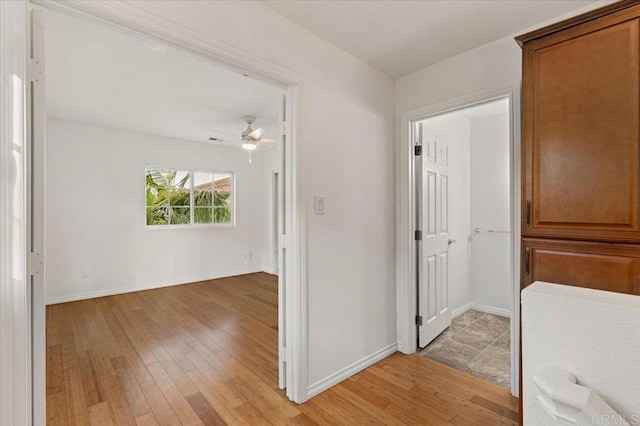 4772 Gateshead Rd, Carlsbad, CA 92010 - corridor featuring light wood-style floors and baseboards