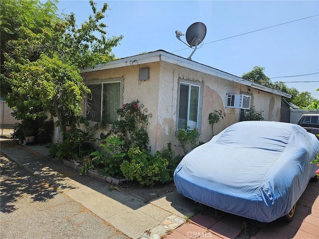 8255 9th St, Rancho Cucamonga, CA 91730 - view of side of property with stucco siding