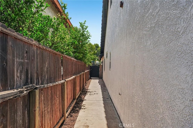 7652 Plumaria, Fontana, CA 92336 - view of side of property with stucco siding