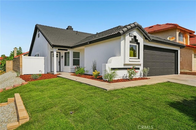 7652 Plumaria, Fontana, CA 92336 - view of front of property featuring a tile roof, driveway, a chimney, a garage, and stucco siding