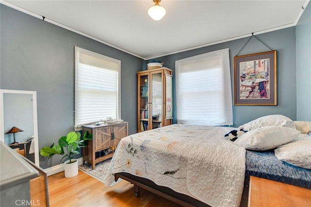 238 S Wabash Ave, Glendora, CA 91741 - bedroom with wood finished floors and ornamental molding