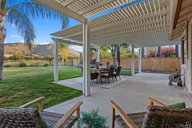 3071 Sprucewood Ln, Escondido, CA 92027 - fenced backyard featuring a pergola, a mountain view, a patio, and a trampoline
