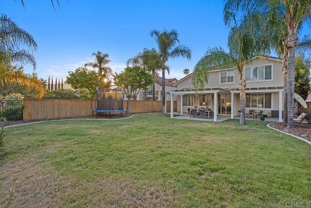 3071 Sprucewood Ln, Escondido, CA 92027 - fenced backyard with a trampoline and a patio