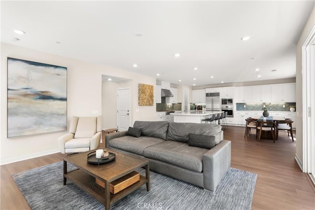 25928 Meadow Dr, San Juan Capistrano, CA 92675 - living room with light wood-style floors and recessed lighting